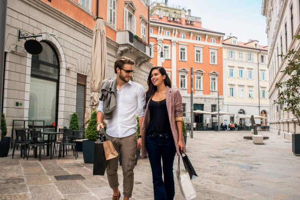 istock beautiful young couple in shopping 685762076