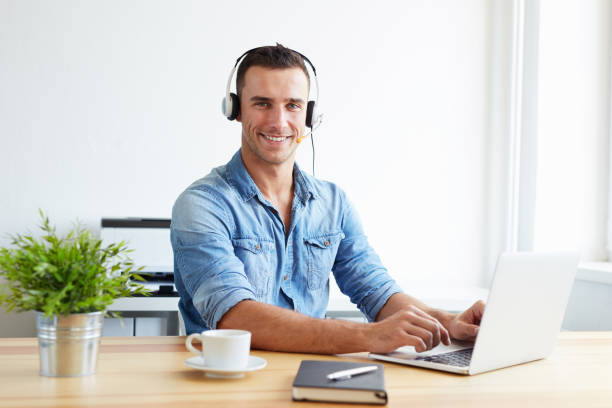 istock Male operator with headset in the office. Assistant in a call center 685762134