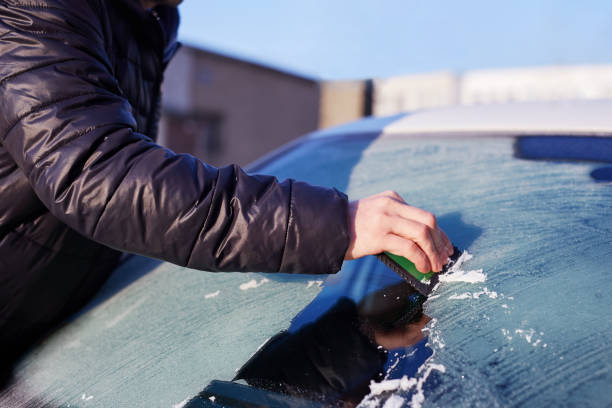 istock Close up of man scraping ice 685762716