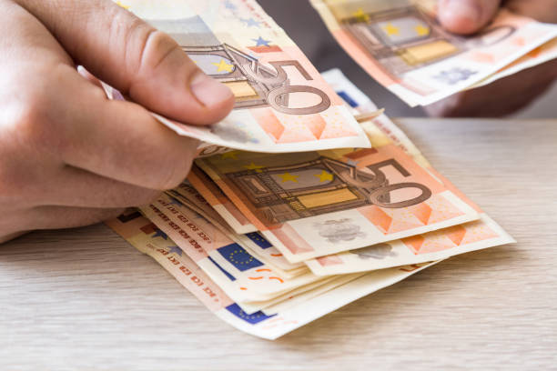 istock Cash counting. Dealing with euro banknotes. 685762734