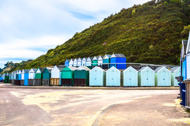 istock Beach huts by a promenade in Bournemouth 685770464