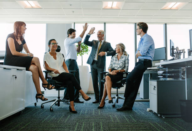 istock Business team enjoying success at office 685774142