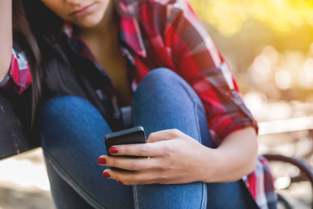 istock Girl text messaging on the phone 685784526