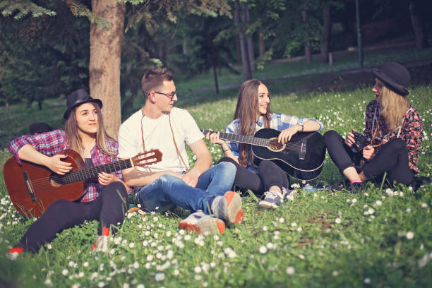 istock Group of friends having fun in a park 685786246