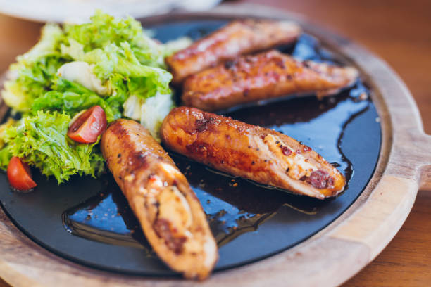 istock Grilled sausagse on wooden board 685787034