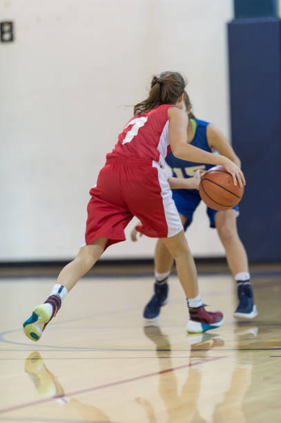 istock Girls high school basketball game 685789384