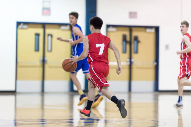 istock Boys high school basketball game 685789404