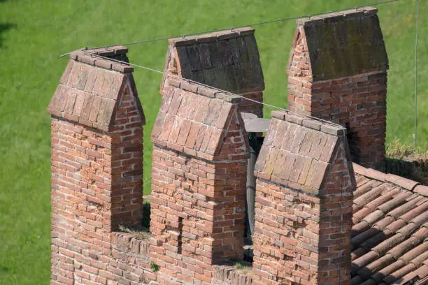 Details of the battlements of a tower.