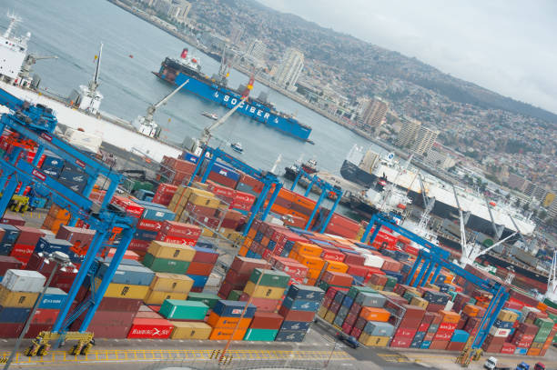 istock Containers ready for shipping, cargoship in background 685793794