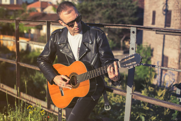 istock Musician playing acoustic guitar 685794004