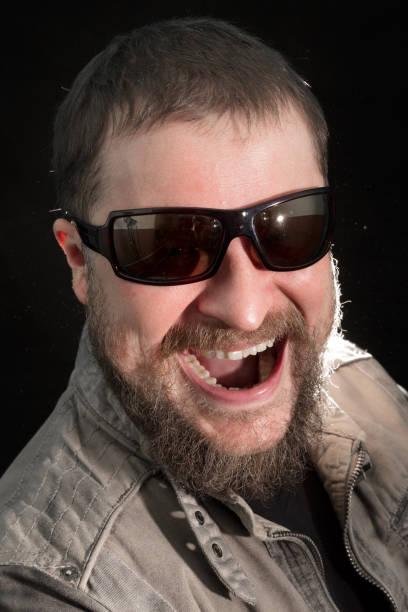 istock Handsome bearded man in sunglasses emotional portrait 685794732