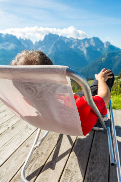 istock Young man relaxing in mountain resort. 685795774