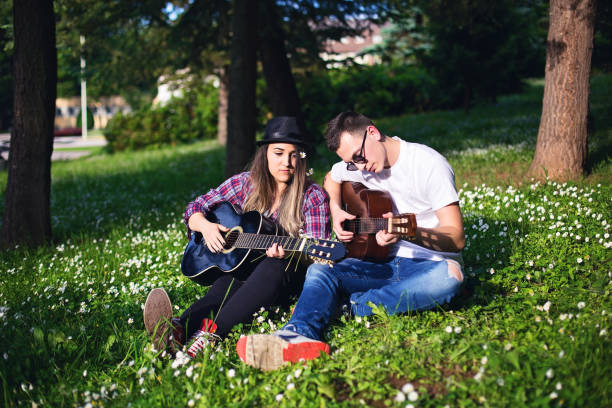istock Romantic couple with acoustic guitar 685797956