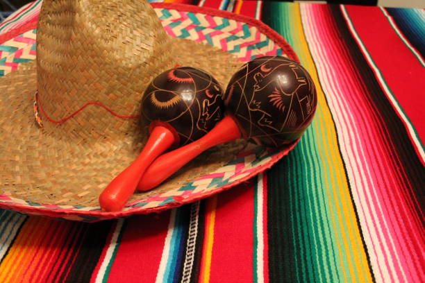 maracas poncho hat Mexican mexico cinco de mayo stock photo