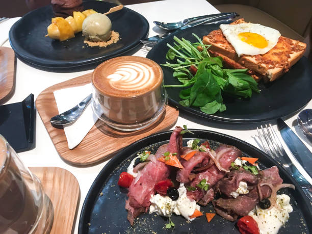 istock Fried egg, rucola, toast, ham and cappuccino for breakfast 685799198