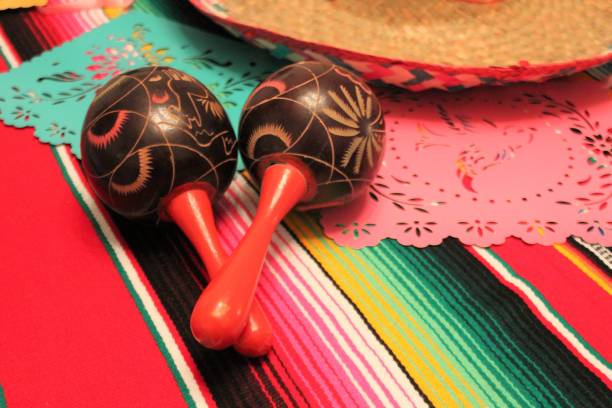 istock Mexico poncho hat maracas background party cinco de mayo decoration bunting flags 685800706