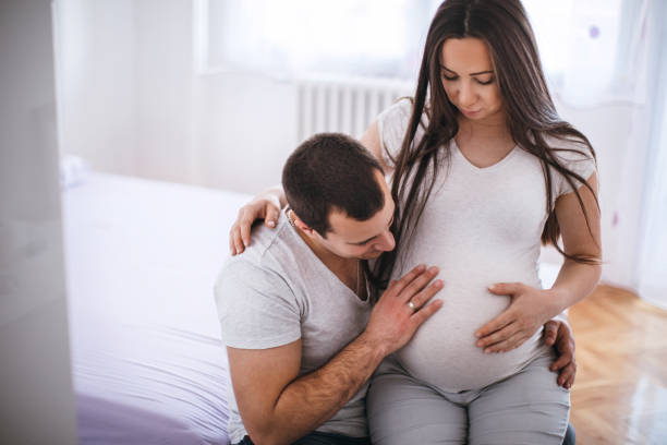 istock Future dad touching pregnant belly 685800846