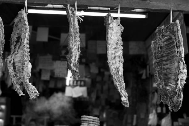 istock Yak meat hangs in a storefront in Lijiiang, China 685801048
