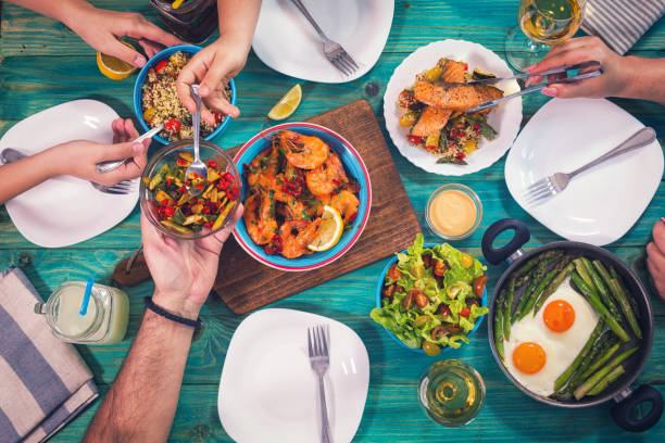 istock Young Family Having Lunch at Home 685801236