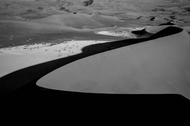 istock Climbing Big Daddy Dune during Sunrise, Looking onto Sossusvlei Salt Pan, Desert Landscape, Namibia 685804410