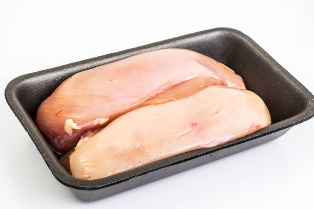 istock Chicken breast fillets raw in food packaging tray 685804712