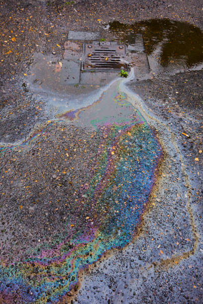 istock Petrol Oil In Water Running Down the Drain 685804940