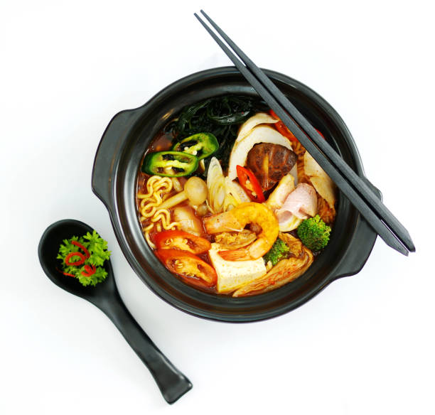 istock Hot chili ramen noodle with seafood in black stew 685809368