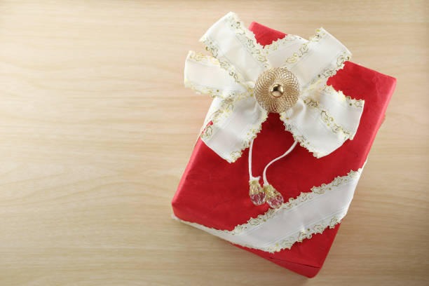 istock Gift box is placed on wooden floor. 685815642