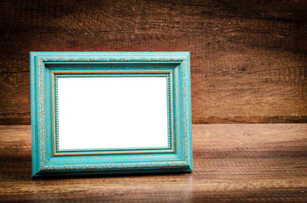 istock Blue blank photo frame on wooden room 685816110