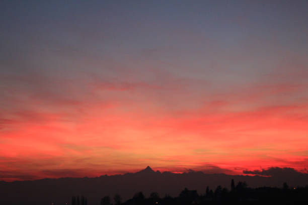 istock orange sunset sky over the hill 685819158