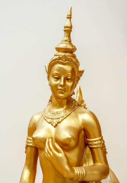 Kinnaree golden statue beautiful of white background in wat thailand