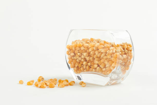 istock yellow corn seed for popcorn in a glass bowl 685834700