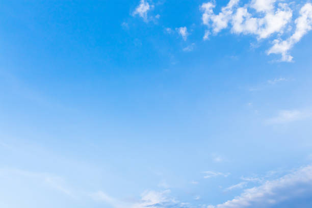 istock White fluffy clouds in the blue sky 685839374