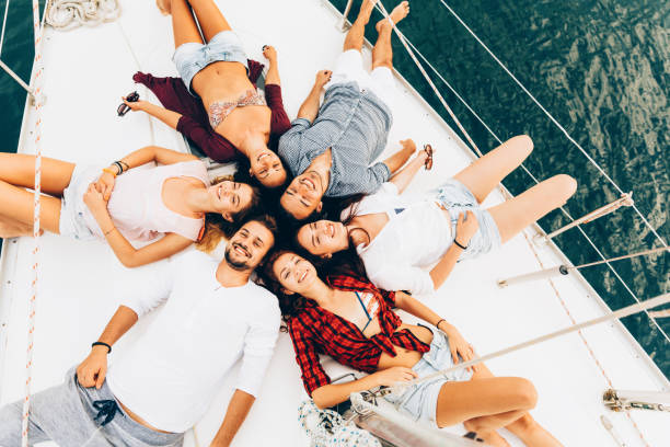 istock Friends lying on a yacht 685841770