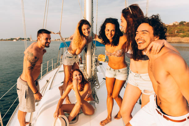 istock Happy friends on a yacht 685841926