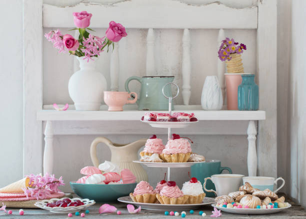 istock pink cakes on plate on white background 685843660