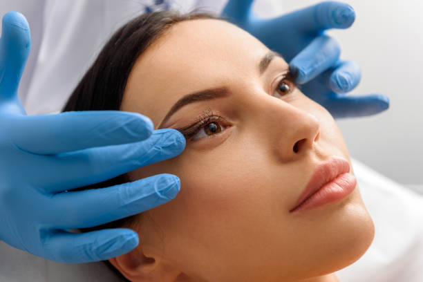 istock Unconcerned female taking face massage in cosmetology 685845510