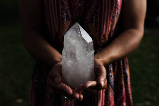 istock Girl Holding a Luminous Quartz Crystal 685846150