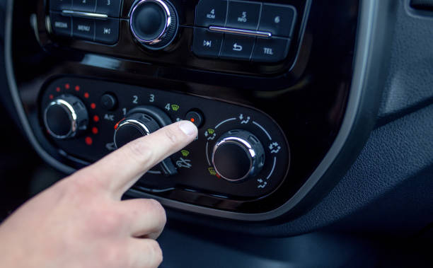 istock Male hand pressing button in modern car 685847502