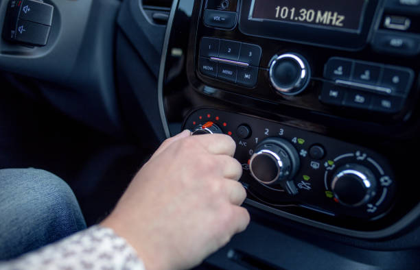 istock Male hand pressing button in modern car 685847522