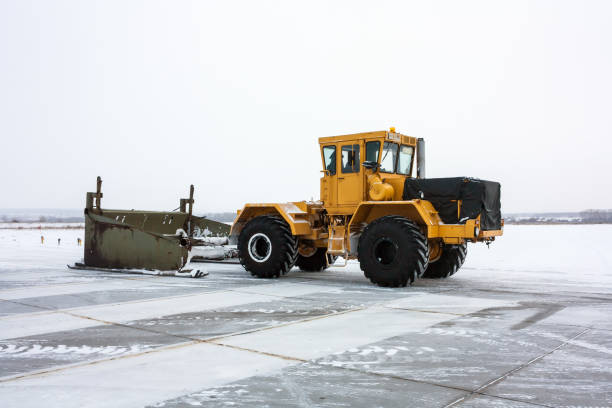 istock Heavy tractor cleans snow on the runway 685850870