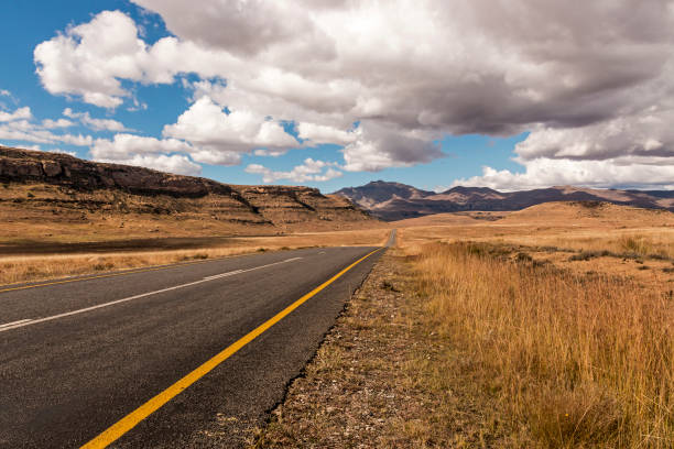 istock Asphalt Road Running Through Dry Orange Winter Mountain Landscape 685859256