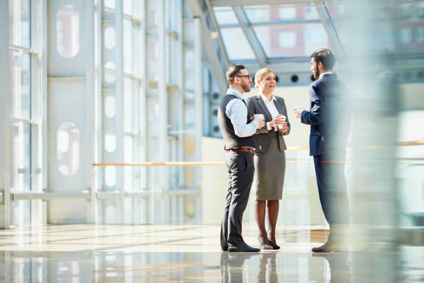 Business Colleagues Chatting at Coffee Break