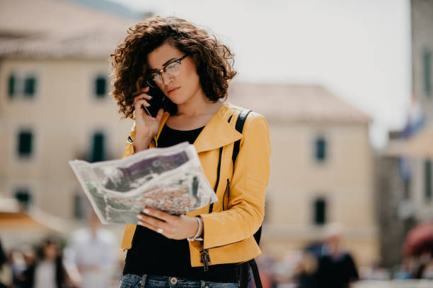 istock Charming curly haired girl talking on the phone 685863230