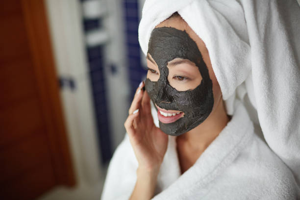 Woman Applying Face Cleaning Scrub Woman Applying Face Cleaning Scrub