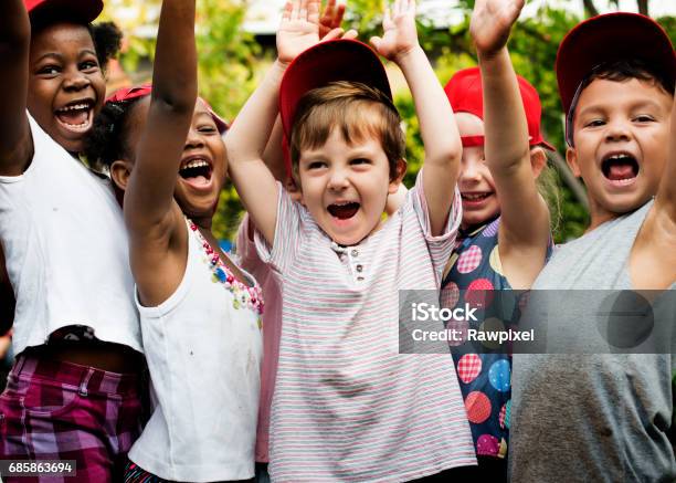 School Kids Cheerful Outdoors Field Trip Stock Photo - Download Image Now - Summer Camp, Child, Hat