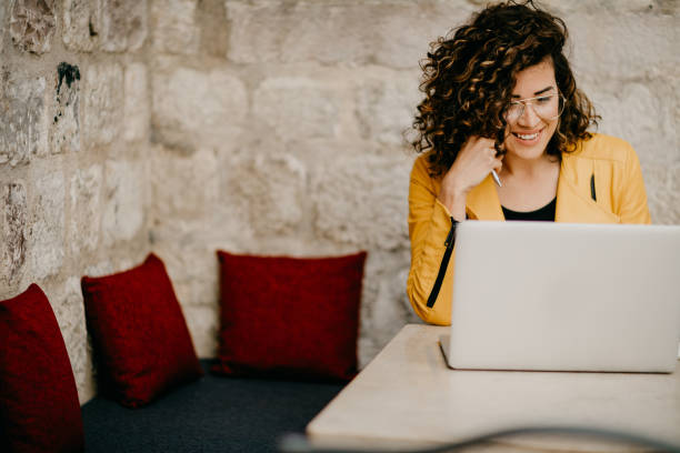 istock Young blogger writing an article about her travel 685865940