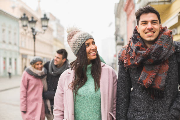 istock Four young people walking together in the city 685870824