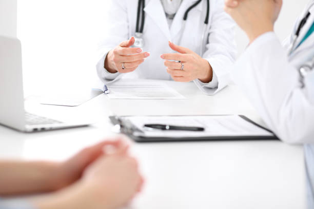 istock Doctor and patient are discussing something, just hands at the table 685872790