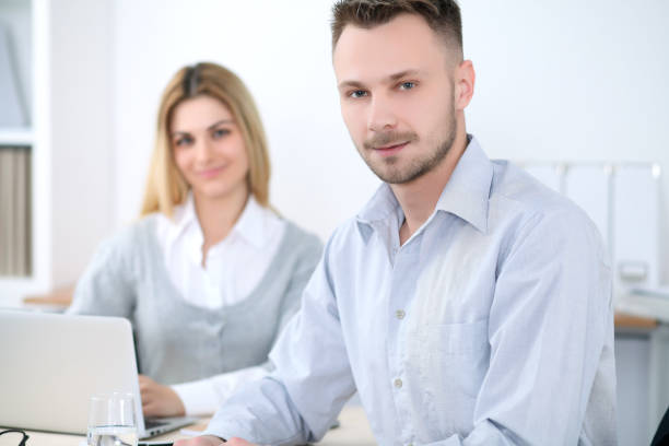 istock Two successful business partners working at meeting in office 685873696